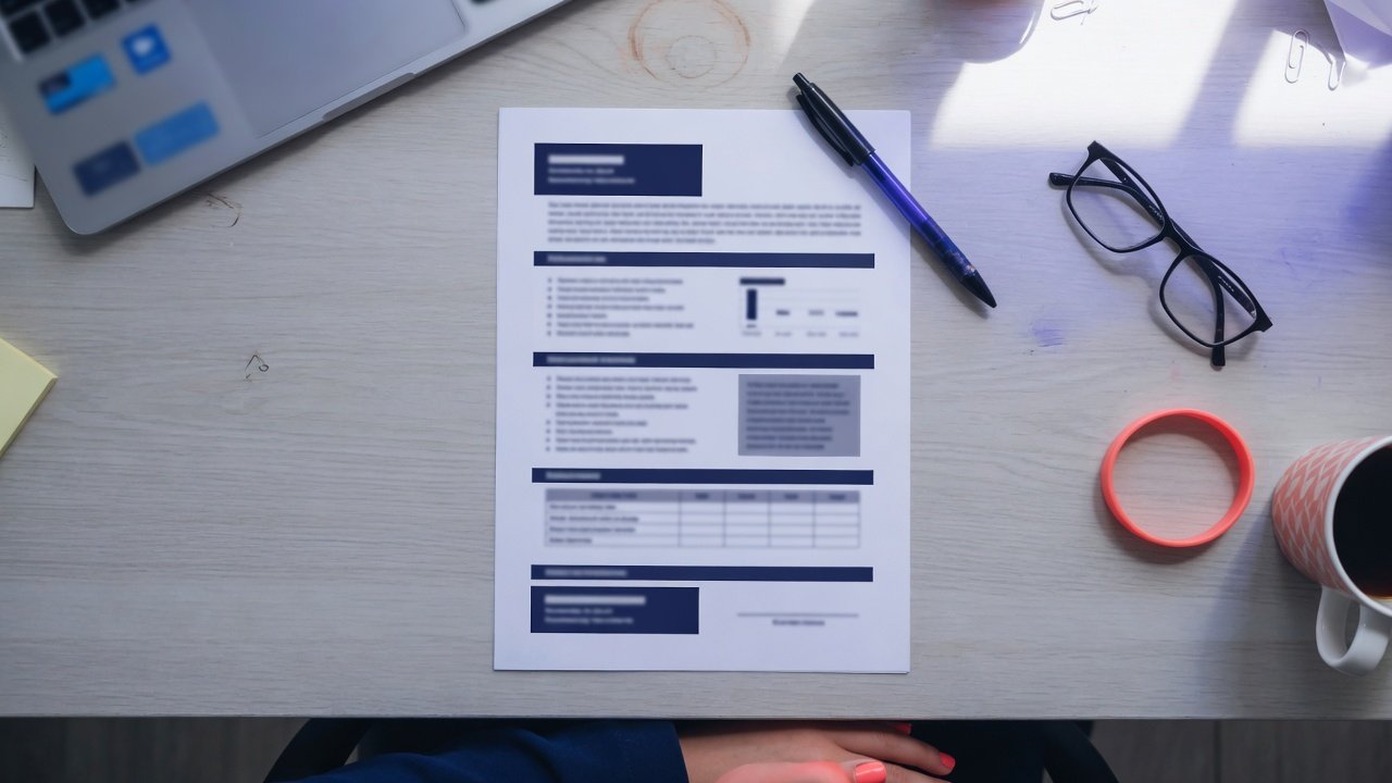 A one-page business case laid out on a desk